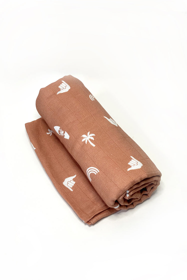 SKYE HI MUSLIN SWADDLE BLANKET - TERRACOTTA ISLAND VIBES