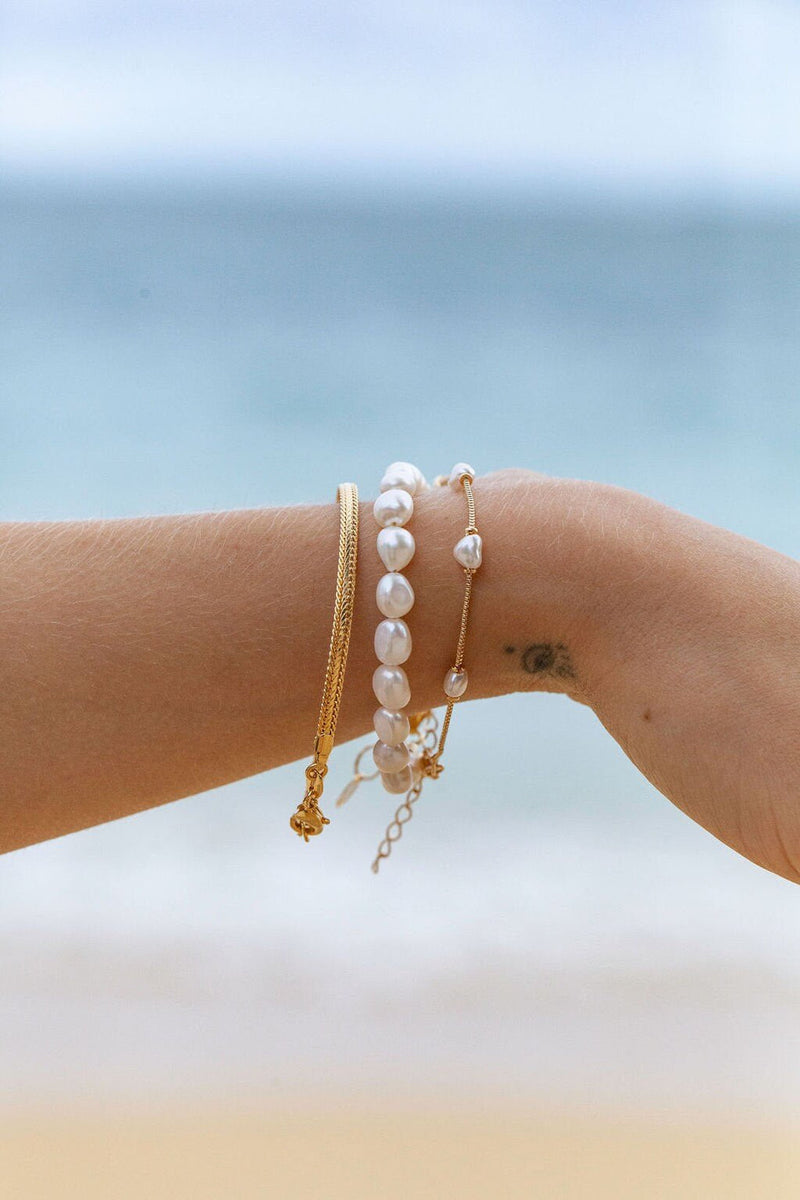 TOUS Yellow Gold White Freshwater Cultured Pearl and Mother-of-Pearl Heart  Bracelet | REEDS Jewelers